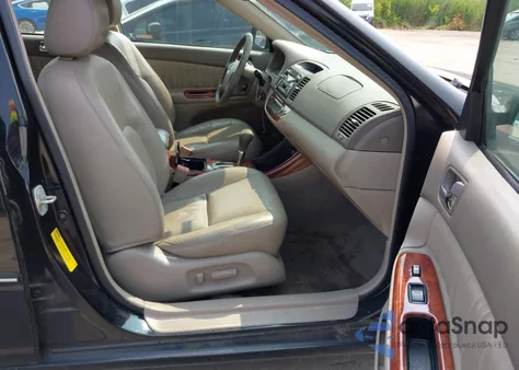 2003 Toyota Camry Xle z USA, uszkodzony, nr VIN 4T1BE30KX3U197331